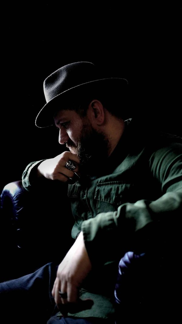 What is the Most Stylish Way to Wear a Fedora in a Professional Environment?